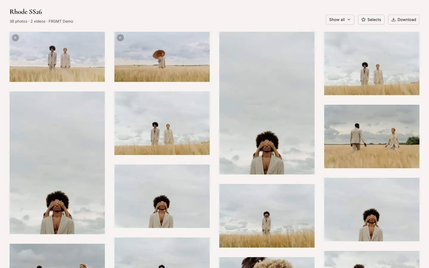 The Rhode SS26 gallery: a four-column mosaic of photos from a fashion shoot in a wheat field, with a Show all menu, Selects and Download at the top