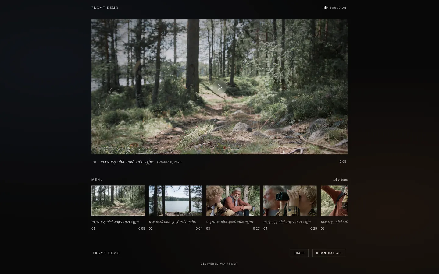 The Camp Nord Cinema page: a path through a pine forest in a wide player, with a menu of fourteen videos below and Share and Download all at the foot